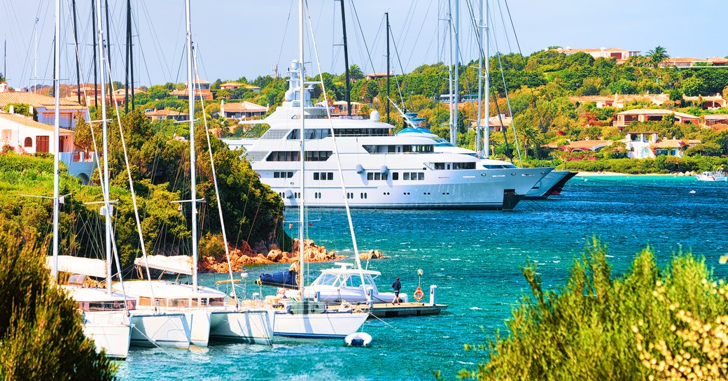 Sailing yachts moored in a marina in Sardinia, Italy